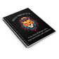 Notebook with a colorful abstract lion head portrait, intense expression, flowing mane, and paint splatters on a black background, featuring the words "BOLD PRESENCE" and inspirational quote "Even when challenges arise, your heart leads with confidence".