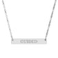 Silver bar necklace with engraved uppercase text "GUIDED" on a sleek matte silver pendant, suspended on a delicate matching silver chain. Minimalist motivational affirmation jewelry for guidance, intuition, and spiritual alignment.