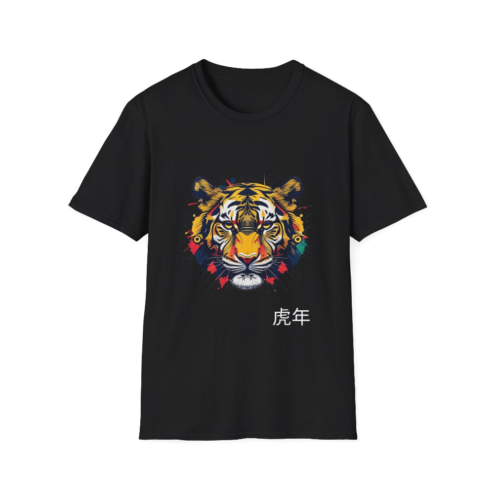 Black unisex cotton t-shirt featuring bold Year of the Tiger graphic: vibrant abstract tiger face portrait with fierce intense eyes, detailed stripes, symmetrical design, large ears, and dynamic multicolored paint splatters in yellow, orange, red, blue, black and teal tones exploding outward. Chinese text "虎年" (Year of the Tiger) printed below in white. Zodiac Chinese New Year motivational crewneck tee.