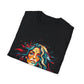 Black folded unisex cotton t-shirt featuring bold "Feral" graphic print: vibrant abstract portrait of a fierce woman with wild flowing multicolored hair, intense expression, tribal markings and forehead jewel, colorful geometric accents, and dynamic paint splatters in red, orange, teal, blue, and gold tones bursting outward. White elegant cursive "Feral" text below. Wild feminine energy motivational crewneck tee.