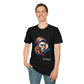 Black unisex cotton t-shirt modeled by smiling man with hand in pocket, featuring bold "Primal" graphic: stylized intense clean-shaven man portrait with short slicked-back hair, vibrant multicolored geometric face in orange, teal, red, yellow and blue tones, dynamic paint splatters and abstract shards exploding outward, moon accent detail. Elegant white cursive "Primal" text below. Primal masculine energy motivational crewneck tee.