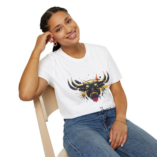 White unisex cotton t-shirt modeled by smiling woman with braided hair, seated pose, hand on cheek, featuring bold Taurus zodiac graphic: vibrant abstract bull head portrait with large curved horns, intense expression, geometric patterns, and dynamic multicolored paint splatters in gold, red, navy, teal, and black tones exploding outward. Elegant black cursive "Taurus" text below. Astrology zodiac motivational crewneck tee.