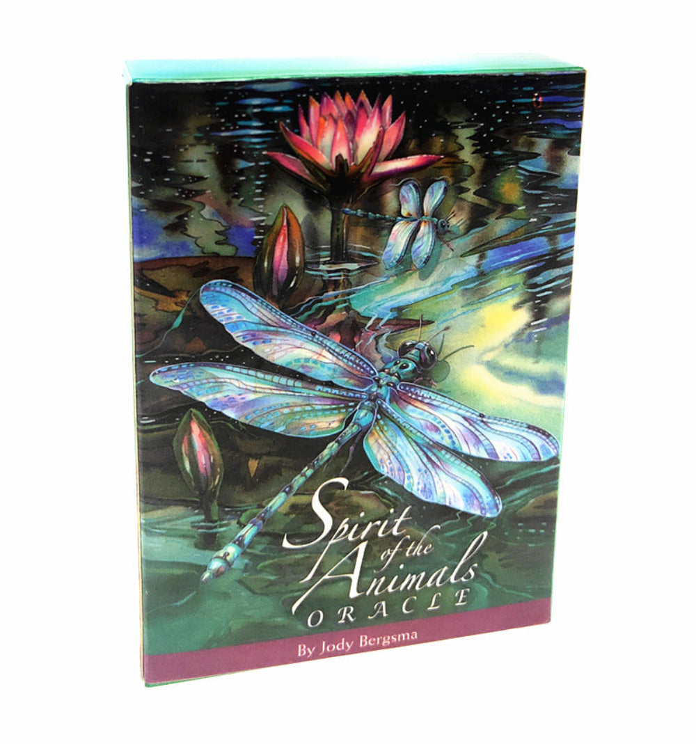 Spirit of the Animals Oracle deck box featuring a vibrant, mystical illustration of a colorful dragonfly over a serene pond with a pink lotus flower. Title "Spirit of the Animals Oracle" by Jody Bergsma. Spiritual animal guidance deck.