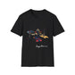 Black unisex cotton t-shirt featuring bold Sagittarius zodiac graphic: vibrant abstract archer silhouette drawing bow, dynamic warrior pose with flowing cape, intricate armor details, and explosive multicolored paint splatters in gold, red, navy, teal, and black tones bursting outward. Elegant white cursive "Sagittarius" text below. Astrology zodiac motivational crewneck tee.