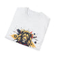 White folded unisex cotton t-shirt featuring bold Leo zodiac graphic print: vibrant abstract lion head portrait with powerful flowing mane, fierce intense eyes, regal expression, geometric accents, and dynamic multicolored paint splatters in gold, red, navy, teal, and black tones exploding outward. Elegant black cursive "Leo" text below. Astrology zodiac motivational crewneck tee.