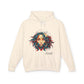 Beige hoodie with a colorful graphic of a woman's face and the word 'Feral' on a white background