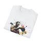 White folded unisex cotton t-shirt featuring bold Aquarius zodiac graphic print: vibrant abstract water bearer figure pouring vessel, dynamic flowing pose, geometric tribal patterns, face paint details, and explosive multicolored paint splatters in gold, red, navy, teal, blue, and black tones bursting outward. Elegant black cursive "Aquarius" text below. Astrology zodiac motivational crewneck tee.