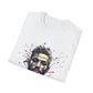 White folded unisex cotton t-shirt featuring bold "Primal" graphic print: vibrant abstract geometric male portrait with intense expression, stylish hair and beard, multicolored shards and accents in red, orange, teal, blue, and gold tones exploding outward with dynamic paint splatters. Elegant white cursive "Primal" text below. Primal masculine energy motivational crewneck tee flat lay.