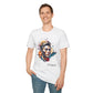 White unisex cotton t-shirt modeled by smiling man with hand in pocket, featuring bold "Primal" graphic: stylized intense clean-shaven man portrait with short styled hair, vibrant multicolored geometric face in orange, teal, red, yellow and blue tones, dynamic paint splatters bursting outward. Elegant black cursive "Primal" text below. Primal masculine energy motivational crewneck tee.