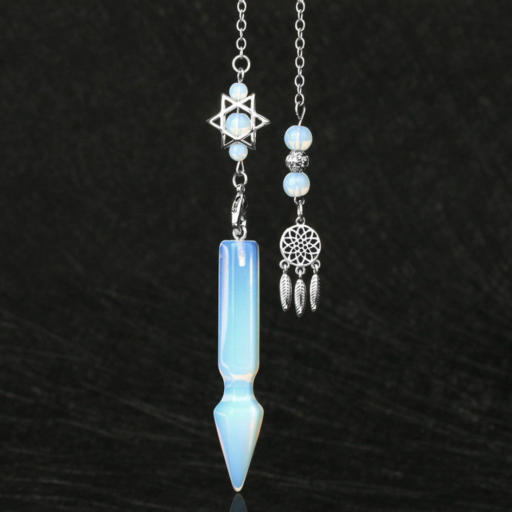 Silver pendulum with a long iridescent light blue opalite crystal point, featuring a Star of David charm with opalite beads above. Beside it is a matching silver dreamcatcher charm with opalite beads and feather details. Crystal dowsing tool set.