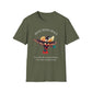 Olive green t-shirt featuring a vibrant hummingbird graphic with the text "MOVE WITH GRACE" arched above and the quote "Even when the world accelerates, Your center remains steady" below. Motivational spiritual apparel.