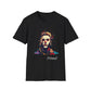 Black unisex cotton t-shirt featuring bold Primal graphic print: stylized intense bearded man portrait with stylish hair, red clown nose accent, vibrant multicolored geometric shards in red, orange, teal, and blue tones, dynamic paint splatters exploding outward, necklace detail. Elegant white cursive "Primal" text below. Primal masculine energy motivational crewneck tee.