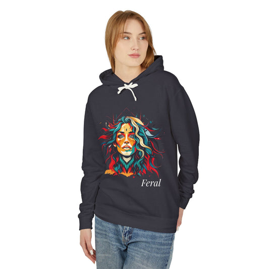 Person wearing a dark hoodie with a colorful graphic design and the word 'Feral' on a white background