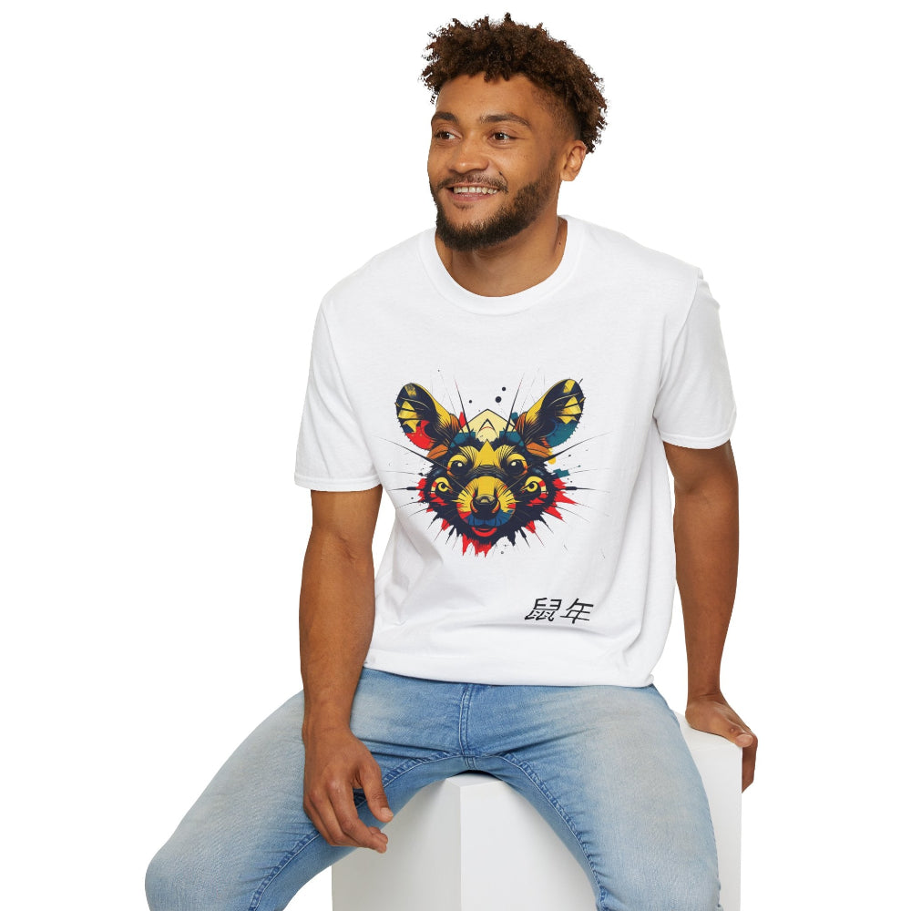 White unisex cotton t-shirt modeled by smiling man with curly hair and beard, featuring bold colorful rat face graphic: vibrant abstract rat portrait with geometric patterns, large ears, intense eyes, multicolored paint splatters in yellow, red, blue, teal, and orange. Chinese text "鼠年" (Year of the Rat) printed below in black. Zodiac Year of the Rat motivational crewneck tee.