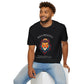 Black unisex cotton t-shirt modeled by smiling man with curly hair and beard, featuring bold "Bold Presence" graphic: vibrant abstract lion head portrait with intense expression, colorful geometric accents, and dynamic paint splatters in red, orange, teal, blue, and gold tones around an orange moon. Arched white text "BOLD PRESENCE" above and smaller quote "Even when challenges arise, your heart leads with confidence" below. Motivational spiritual empowerment crewneck tee.