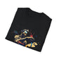 Black folded unisex cotton t-shirt featuring bold Aquarius zodiac graphic print: vibrant abstract water bearer figure pouring vessel, dynamic flowing pose, tribal face paint details, intricate geometric patterns, and explosive multicolored paint splatters in gold, red, navy, teal, blue, and black tones bursting outward. Elegant black cursive "Aquarius" text below. Astrology zodiac motivational crewneck tee.