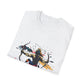 White folded unisex cotton t-shirt featuring bold Sagittarius zodiac graphic print: vibrant abstract archer silhouette drawing bow, dynamic warrior pose with flowing cape, intricate armor details, and explosive multicolored paint splatters in gold, red, navy, teal, and black tones bursting outward. Elegant black cursive "Sagittarius" text below. Astrology zodiac motivational crewneck tee.
