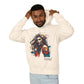 Man wearing a cream hoodie with a graphic design of a woman and the word 'Feral' on a white background