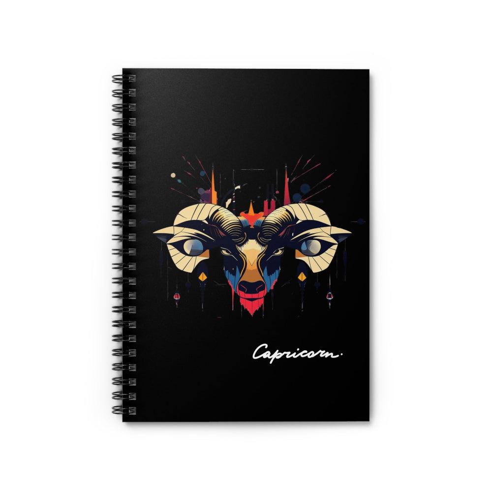 Notebook with a colorful abstract Capricorn goat head portrait, large curved horns, intense eyes, geometric patterns, and paint splatters on a black background, featuring the word "Capricorn".