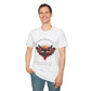 White unisex cotton t-shirt modeled by smiling man with short brown hair, featuring bold "Follow Your Light" graphic: vibrant abstract moth/butterfly with detailed wings, intense expression, colorful geometric accents, and dynamic paint splatters in red, orange, teal, blue, and gold tones around an orange moon. Arched white text "FOLLOW YOUR LIGHT" above and smaller quote "Even when others can't see where you're going, see with your own eyes" below. Motivational spiritual empowerment crewneck tee.