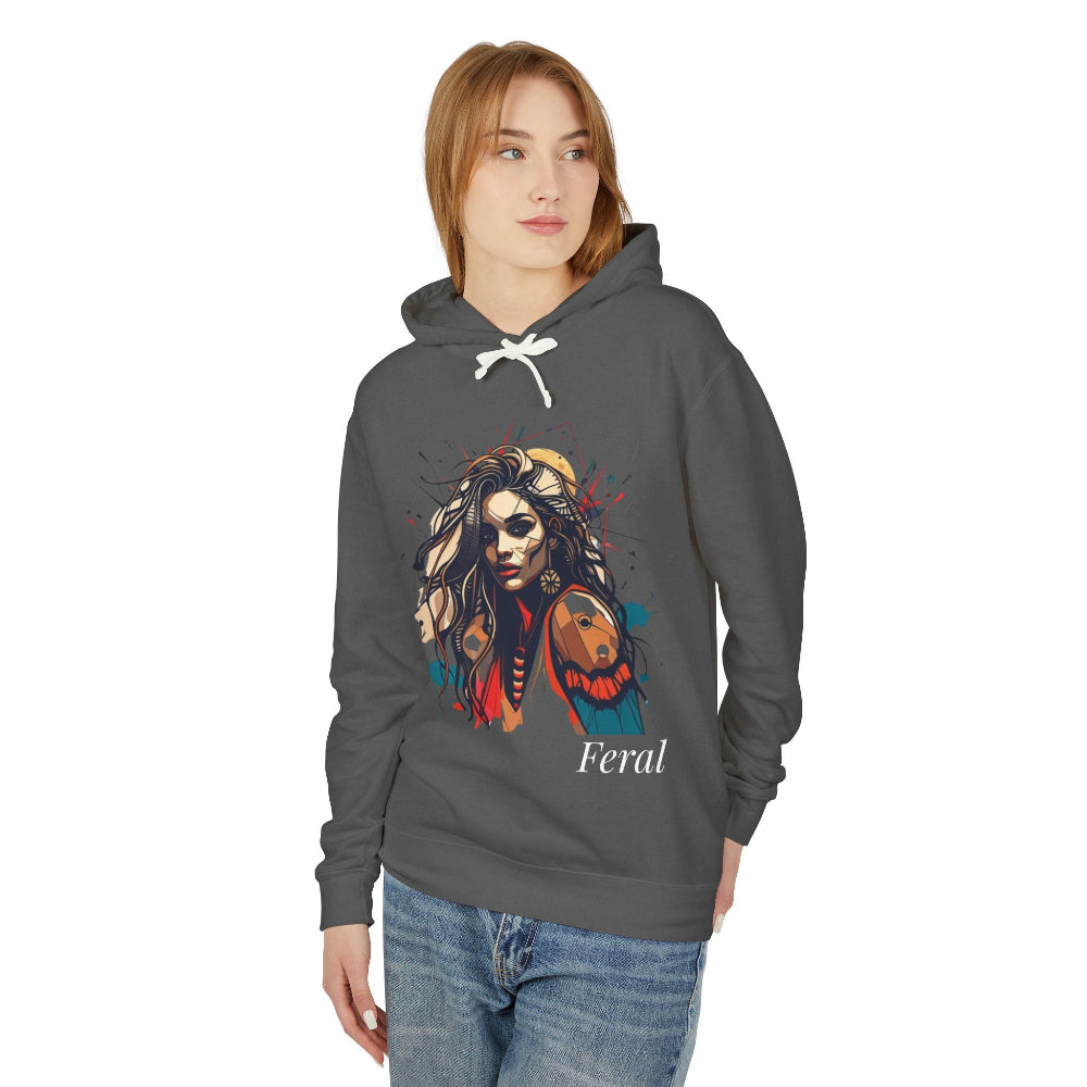 Woman in charcoal feral hoodie, colorful wild woman with wolf graphic and "Feral" text