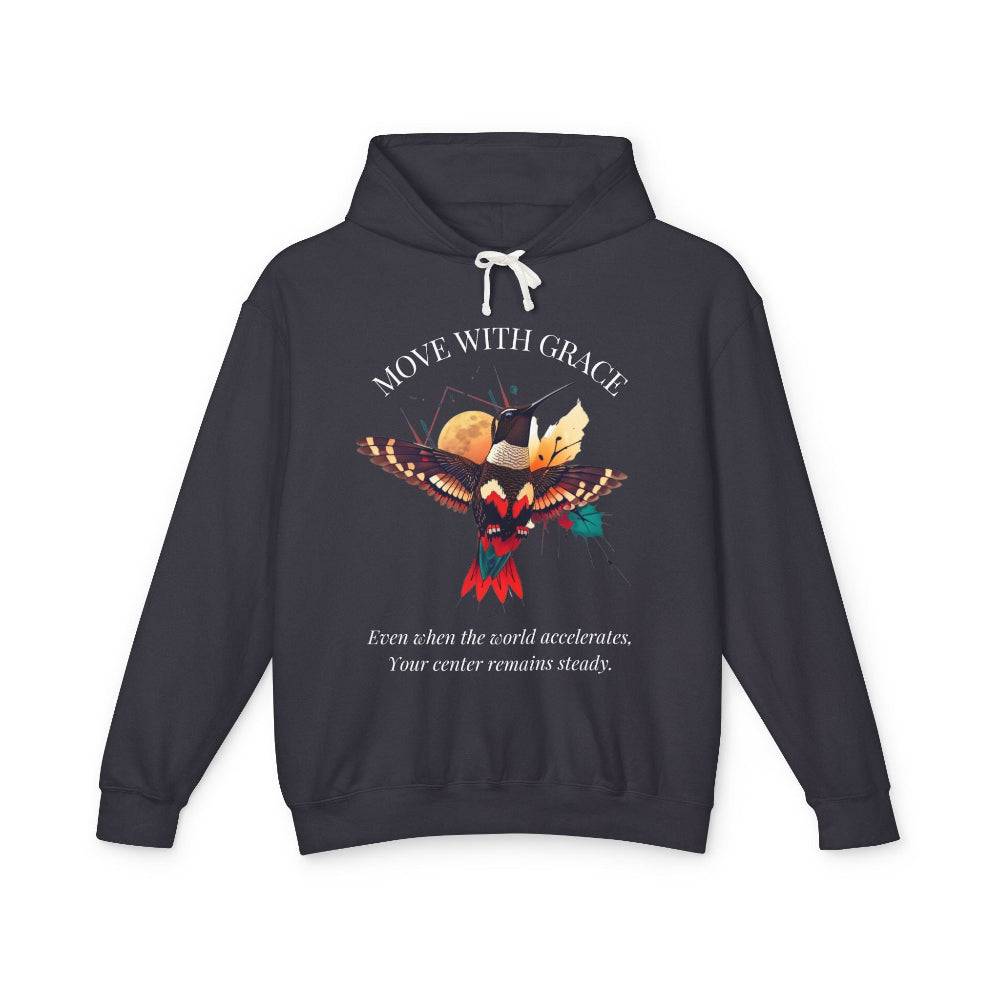 Black hoodie with 'Move With Grace' inspirational hummingbird graphic and quote 'Even when the world accelerates, Your center remains steady' printed on the front.