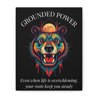 Close up of black canvas wall art print of colorful abstract bear head with intense expression, flowing mane, geometric accents, and cosmic splatters on dark background. Arched white text "GROUNDED POWER" above and quote "Even when life is overwhelming, your roots keep you steady" below. 