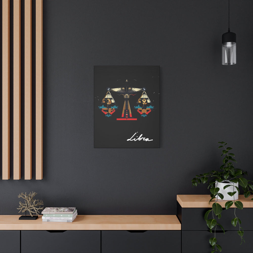 Libra zodiac canvas wall art featuring artistic balance scales illustration on black background, displayed in modern interior above wooden console with plant