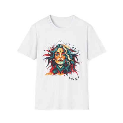 White unisex cotton t-shirt featuring bold "Feral" graphic: vibrant abstract portrait of a fierce woman with wild flowing multicolored hair, intense expression, tribal markings and forehead jewel, colorful geometric accents, and dynamic paint splatters in red, orange, teal, blue, and gold tones bursting outward. White elegant cursive "Feral" text below. Wild feminine energy motivational crewneck tee.