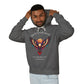 Young man modeling charcoal gray hoodie with colorful abstract eagle/phoenix graphic, "TRUST YOUR VISION" arched above, and inspirational quote "Even when others can't see what you see" below, pulling up hood