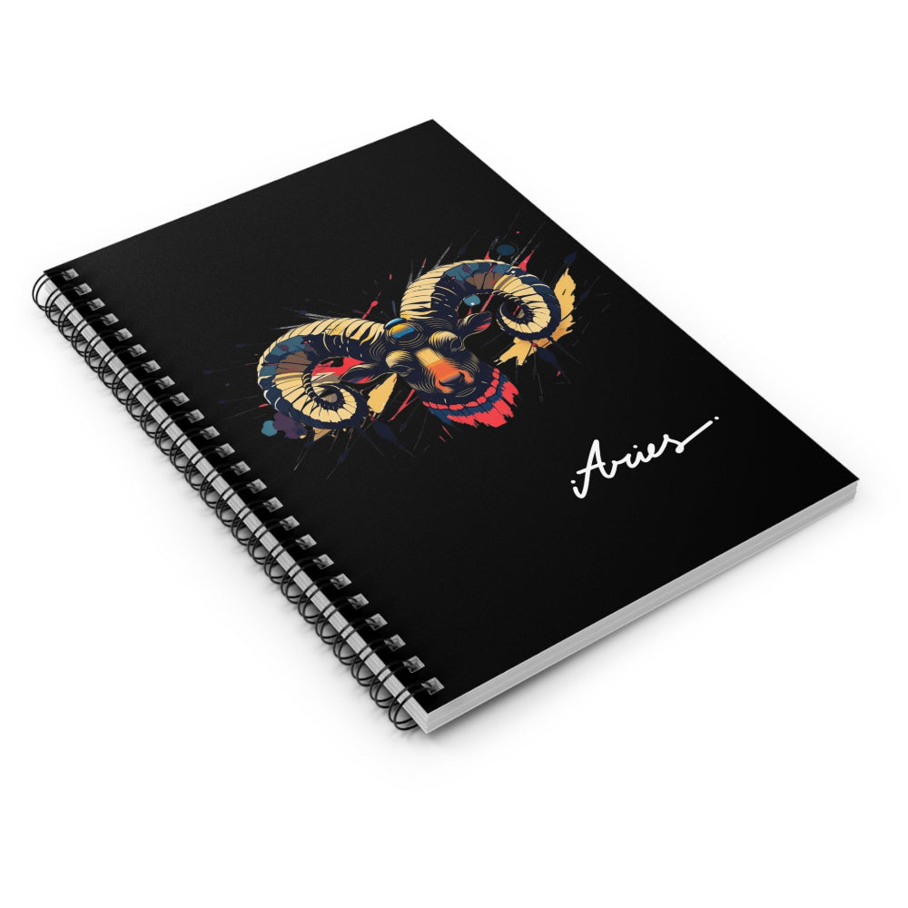 Notebook with a colorful abstract Aries ram head portrait, large curved horns, intense expression, and paint splatters on a black background, featuring the word "Aries".