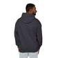 Back view of Man wearing a dark gray hoodie on a white background
