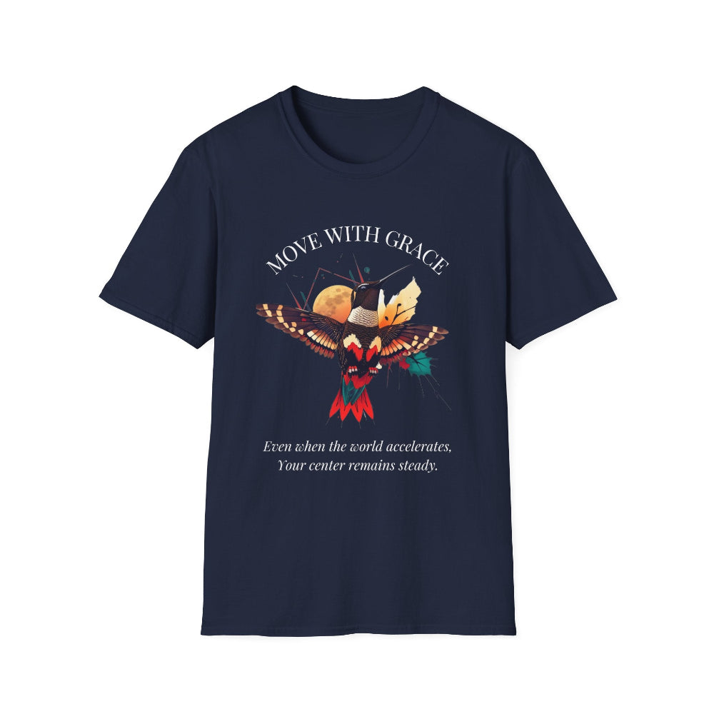 Navy blue t-shirt featuring a vibrant hummingbird graphic with the text "MOVE WITH GRACE" arched above and the quote "Even when the world accelerates, Your center remains steady" below. Motivational spiritual apparel.