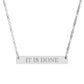 Silver bar necklace with engraved uppercase text "IT IS DONE" on a sleek matte silver pendant, suspended on a delicate matching silver chain. Minimalist motivational affirmation jewelry for manifestation and completion.