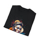 Black folded unisex cotton t-shirt featuring bold Primal graphic print: stylized intense clean-shaven man portrait with short slicked-back hair, vibrant multicolored geometric face in orange, teal, red, yellow and blue tones, dynamic paint splatters, abstract shards, and moon accent detail exploding outward. Primal masculine energy motivational crewneck tee.