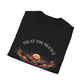 Black folded unisex cotton t-shirt featuring bold "Trust the Silence" graphic print: vibrant abstract owl with detailed feathers, intense eyes, colorful geometric accents, and dynamic paint splatters in red, orange, teal, blue, and gold tones bursting outward around an orange moon background. Arched white text "TRUST THE SILENCE" above. Motivational spiritual empowerment crewneck tee flat lay.