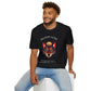 Black unisex cotton t-shirt modeled by smiling man with curly hair and beard, featuring bold "Shadow Guide" graphic: vibrant abstract wolf head portrait with intense expression, colorful geometric accents, and dynamic paint splatters in red, orange, teal, blue, and gold tones around an orange moon. Arched white text "SHADOW GUIDE" above and smaller quote "Even when fear appears, your intuition shows the way" below. Motivational spiritual empowerment crewneck tee.