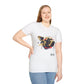 White unisex cotton t-shirt modeled by smiling plus-size female with long blonde hair, hand on hip, featuring bold Year of the Dog zodiac graphic: vibrant abstract dog face portrait with intense glowing eyes, detailed fur texture, alert playful expression, geometric accents, and dynamic multicolored paint splatters in gold, red, black, blue, teal, and orange tones exploding outward. Chinese text "狗年" (Year of the Dog) printed below in black. Chinese New Year zodiac motivational crewneck tee.
