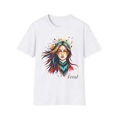 White unisex cotton t-shirt featuring bold "Feral" graphic: vibrant abstract portrait of a fierce woman with wild flowing multicolored hair, intense expression, tribal markings and forehead jewel, colorful geometric accents, and dynamic paint splatters in red, orange, teal, blue, and gold tones bursting outward around an orange moon background. White elegant cursive "Feral" text below. Wild feminine energy motivational crewneck tee.