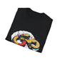 Black folded unisex cotton t-shirt featuring bold Year of the Snake graphic print: vibrant abstract coiled snake in infinity/figure-8 shape with fierce expression, detailed scales, hypnotic eyes, and dynamic multicolored paint splatters in gold, red, black, green, teal, and orange tones exploding outward. Chinese text "蛇年" (Year of the Snake) printed below in white. Zodiac Chinese New Year motivational crewneck tee.