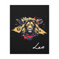 Close-up of Leo zodiac canvas art featuring a bold golden lion illustration with colorful cosmic splashes on black background and stylized Leo text