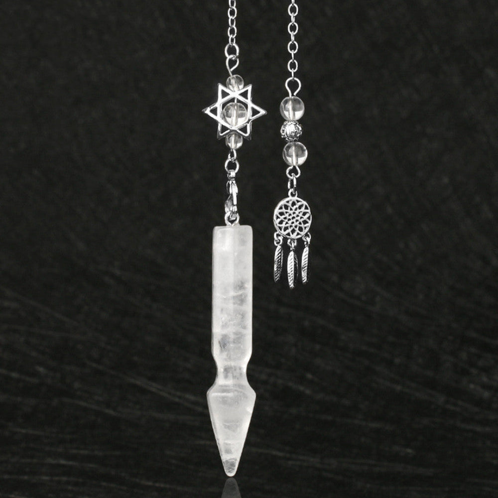 Silver pendulum with a long clear quartz crystal point, featuring a Star of David charm with clear quartz beads above. Beside it is a matching silver dreamcatcher charm with clear quartz beads and feather details. Crystal dowsing tool set.