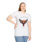 White plus-size unisex cotton t-shirt modeled by smiling woman with long blonde hair, hand on hip, featuring bold "Trust Your Vision" graphic on chest: vibrant abstract phoenix/eagle with spread wings, intense expression, colorful geometric accents, and dynamic paint splatters in red, orange, teal, blue, and gold around an orange moon. Arched white text "TRUST YOUR VISION" above and smaller quote "Even when others can't see what you see" below. Motivational spiritual empowerment crewneck tee.