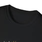 Close-up view of black unisex cotton crewneck t-shirt collar: soft ribbed neckline with clean stitching and comfortable fit. Premium quality durable crew neck construction detail on black graphic tee.