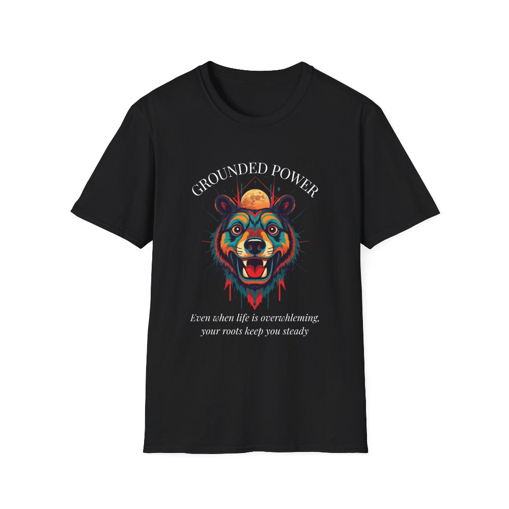 Black unisex cotton t-shirt featuring bold "Grounded Power" graphic: vibrant abstract bear head portrait with intense expression, colorful geometric accents, and dynamic paint splatters in red, orange, teal, blue, and gold tones bursting outward around an orange moon background. Arched white text "GROUNDED POWER" above and smaller inspirational quote "Even when life is overwhelming, your roots keep you steady" below. Motivational spiritual empowerment crewneck tee.