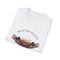 White folded unisex cotton t-shirt featuring bold "Trust the Silence" graphic print: vibrant abstract owl with detailed feathers, intense eyes, colorful geometric accents, and dynamic paint splatters in red, orange, teal, blue, and gold tones bursting outward around an orange moon background. Arched white text "TRUST THE SILENCE" above. Motivational spiritual empowerment crewneck tee flat lay.