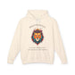 Cream hoodie with vibrant multicolored lion head graphic, mane in orange teal blue splashes, "BOLD PRESENCE" arched text above, motivational quote "Even when challenges arise, your heart leads with confidence" below