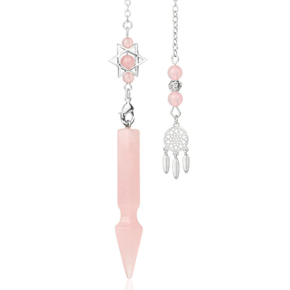 Silver pendulum with a long polished rose quartz crystal point, featuring a Star of David charm with rose quartz beads above. Beside it is a matching silver dreamcatcher charm with rose quartz beads and feather details. Crystal dowsing tool set.